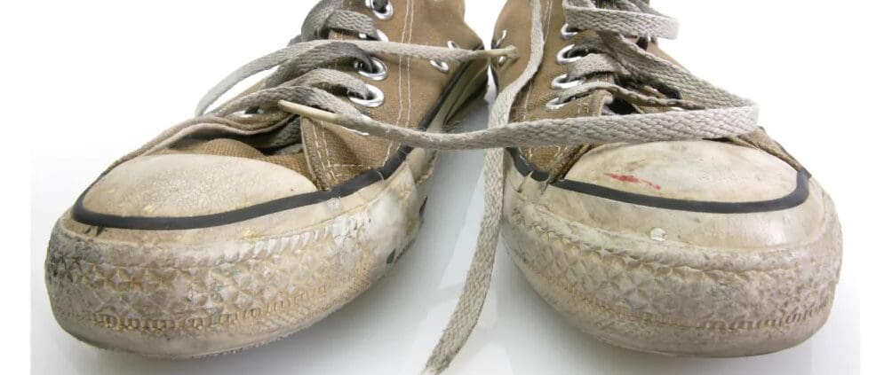 dirty shoes in white background