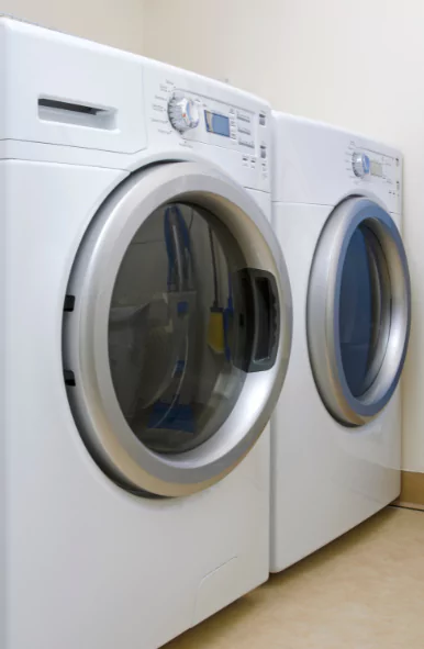 washer and dryer set in laundry room