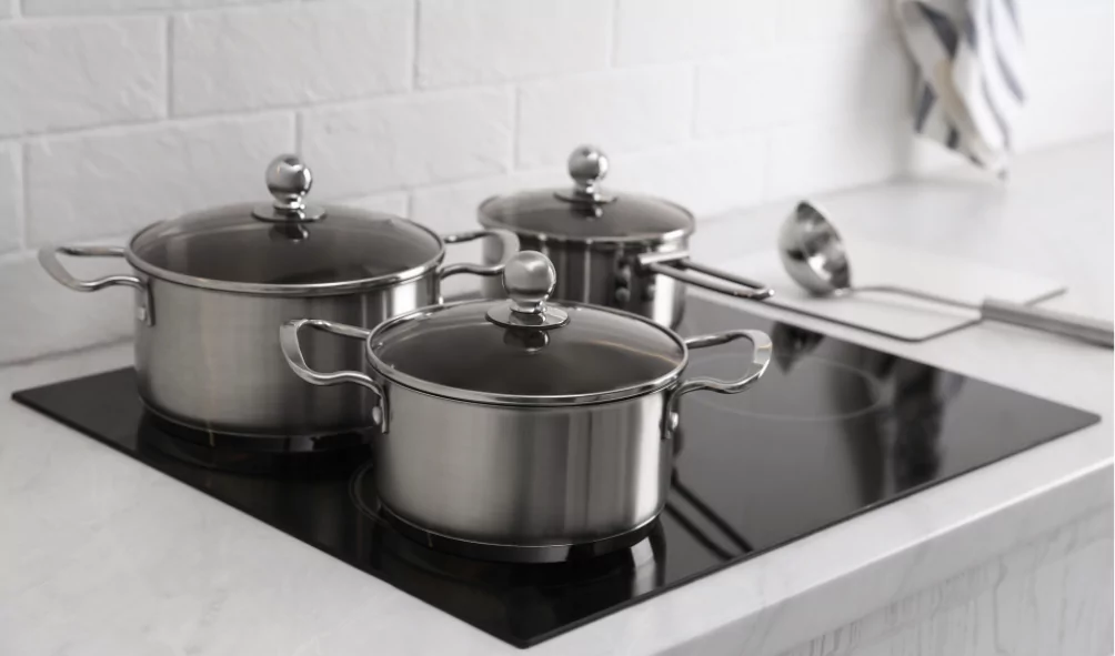 electric cooktop with pots